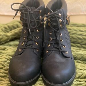 Black Combat Boots with Gold Buckle.